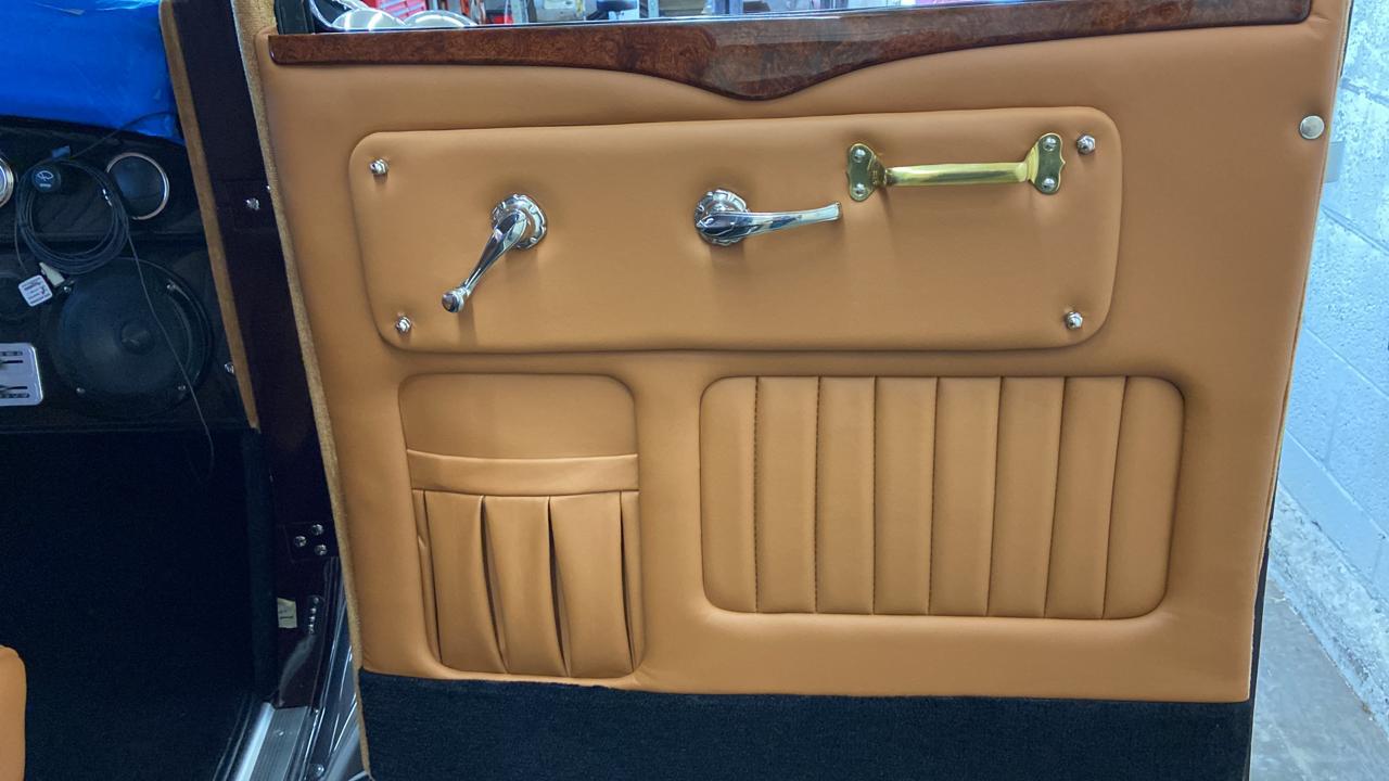 Camel leather door with wood